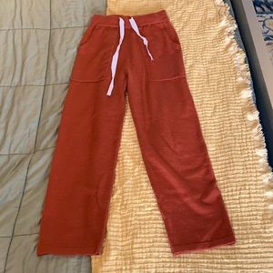 Red-orange sweatpant with big pockets